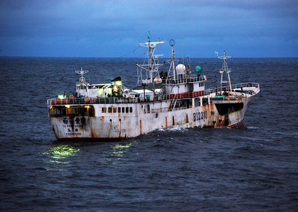 Yu Feng, a vessel with Taiwanese flags suspected of fishing illegally, sails near Sierra Leone in 2009 before being detained by the U.S. Coast Guard and Sierra Leonean government agencies. Photo credit: U.S. Department of Defense/Petty Officer 2nd Class Shawn Eggert, U.S. Coast Guard.