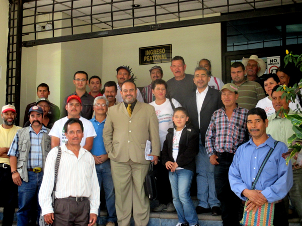 San Juan Bosco and Mataquescuintla residents gather with their lawyers on the courtroom steps in Guatemala City in May 2015, following a hearing concerning the legality of a mining exploration license the government granted to Tahoe Resources. The license could potentially enable the company to further expand the contested Escobar mine. Photo credit: Sandra Cuffe.