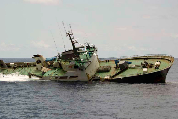 The Thunder goes down near Sao Tome and Principe off the coast of West Africa, having been deliberately sunk by its own captain and officers, according to the conservation group Sea Shepherd. The group says its vessel Bob Barker pursued the Thunder more than 11,500 miles from the Southern Ocean, where it was illegally fishing for toothfish. Photo credit: Sea Shepherd/Simon Ager.