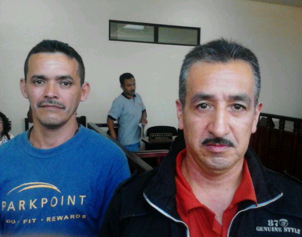 Saúl Méndez (left) and Rogelio Velásquez, pictured above in court after an appeal hearing on April 29, 2015, have spent most of the past three years in pretrial detention on various charges. They are both community leaders who oppose hydroelectric dams in Santa Cruz Barillas, Guatemala. Photo credit: Gustavo Illescas / Centro de Medios Independientes.